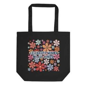 Black tote bag with bright retro floral pring with saying: Celebrate Minds Of All Kinds.